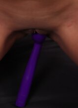 Big breasted MILF Abby Melon toys her shaved pussy.
