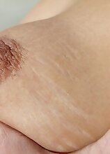 Exotic mature babe Zoe Gyro fingers her twat.