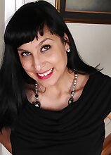 Hairy MILF Penelope Patterson in only black stockings.