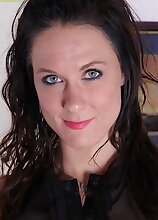 Brunette MILF Mari Lee exposes her pierced clit.