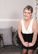 Naughty older lady playing with her pussy