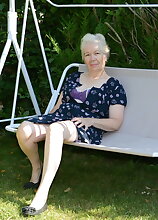Horny British mature lady playing in the garden
