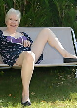Horny British mature lady playing in the garden