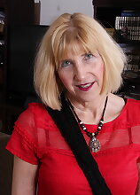 Naughty American mature lady teasing and playing