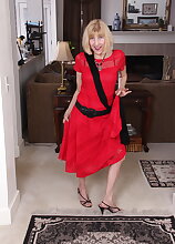 Naughty American mature lady teasing and playing