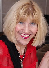 Naughty American mature lady teasing and playing