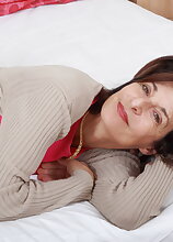 Naughty mature lady playing with herself