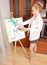 Naughty mature lady playing with paint