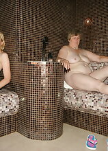 Mature women relaxing in a sauna