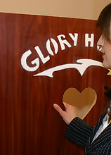 Mature slut sucking and fucking through the gloryhole