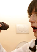 Mature slut sucking and fucking through the gloryhole