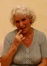 This grandma loves playing with her wet pussy