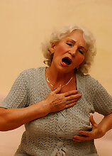 This grandma loves playing with her wet pussy