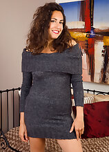 Sexy 33 year old brunette Isabelle looking elegant in her gray dress