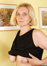 All natural blonde Hillary spreading her 51 year old hairy pussy wide