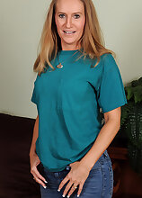 Hot blonde housewife Sara J strips and pinches her perky nipples