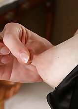 Elegant and mature Brittany slips of of her black dress in here