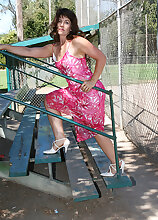 41 year old Andie shows her mature bush while playing in the park