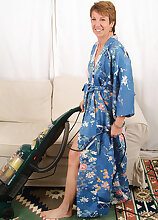 All natural and hairy MILF Ember has fun with housework