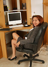 Hot redheaded Mexican MILF Cynthia spreads at the office