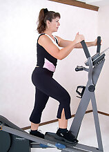 Furry pussied Andie works out and then spreads legs