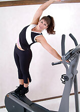 Furry pussied Andie works out and then spreads legs