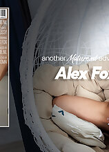 Hot Alex Fox is a skinny, small breasted MILF playing with her shaved big pussy