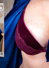 Mature lady playing in bath