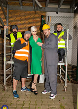 Hot big breasted Milf Tanya Virago is the center of a  good hard Gang Bang