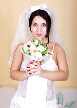 Beautiful bride Tanita in white