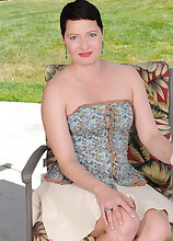 Beautiful Kali Karinena strips on her lawn chair