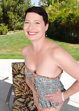 Beautiful Kali Karinena strips on her lawn chair