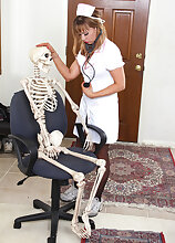 Naughty nurse Christy James bones a skeleton