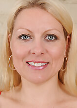 Beautiful blonde Zoey Tyler looks amazing in her thigh high nylon stockings