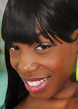 Lovely MILF Pepper Deville shows her sexy smooth dark skin in the nude