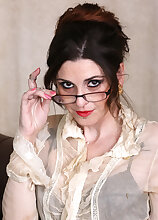 Bespectacled businesswoman Aurora Jade spreads her legs on the desk