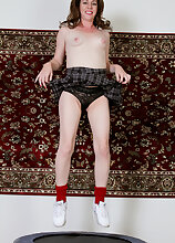 Cute 41 year old Molly Golly gets naked on the trampoline in here
