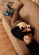 Busty 30 year old Kiki from AllOver30 strips from her black lace here