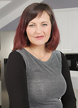 Mature 45 year old Justina from AllOver30 showing a warm hairy pussy