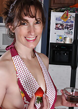 Skinny 41 year old Celeste Carpenter slips a strawberry in her puss
