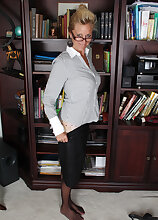 Watch blonde 44 year old Heidi Gallo spread her legs in the library