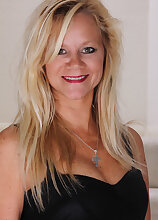 44 year old Heidi Gallo gets naked and spreads her legs on the stairs