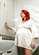 Masturbating MILF Marta Bellefleur is pregnant and very horny and she takes matters in her own hand