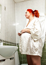 Masturbating MILF Marta Bellefleur is pregnant and very horny and she takes matters in her own hand