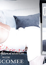 Mature.nl - Lancomee is a shaved MILF that loves to play with her pussy in bed getting an orgasm